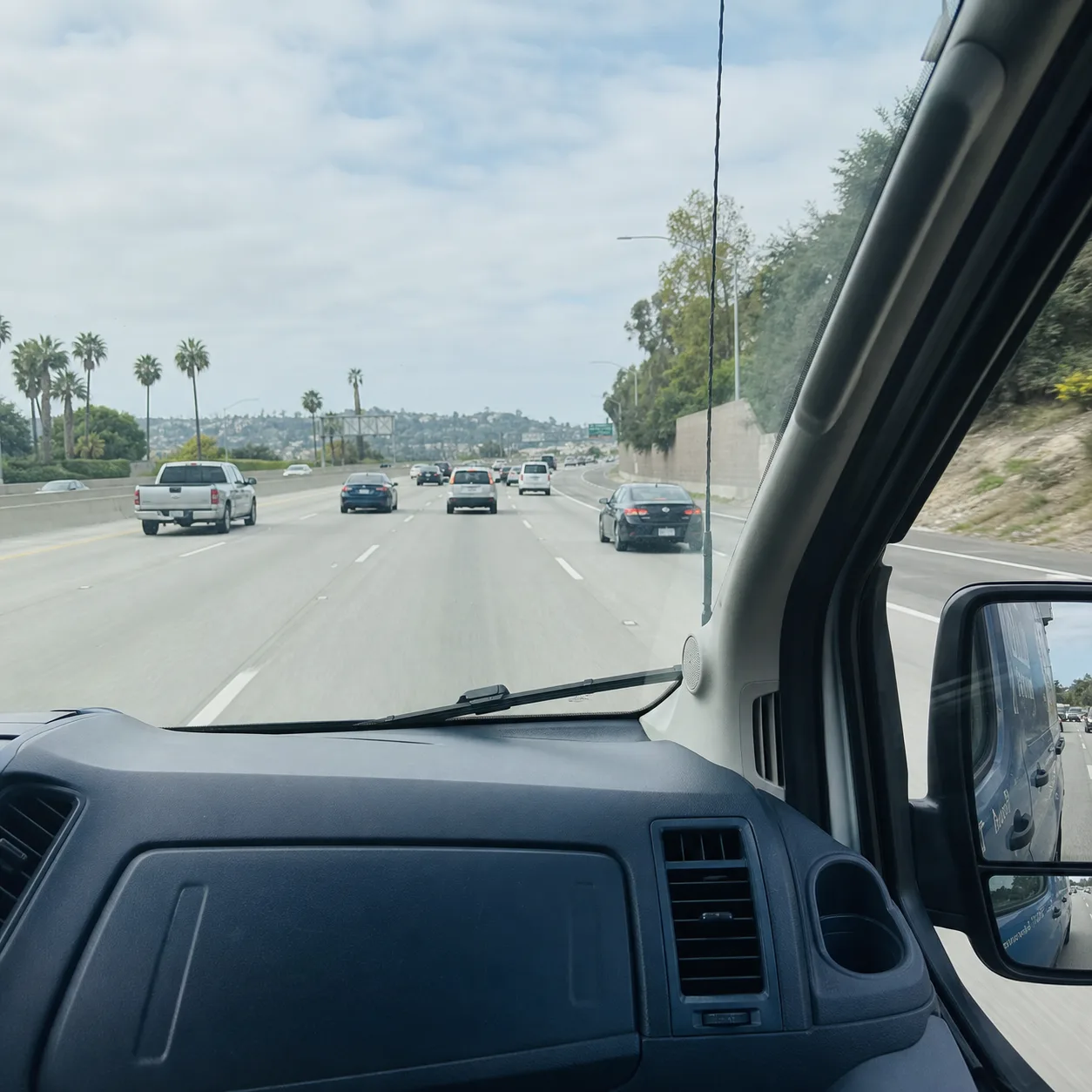 Service van on the freeway heading to a job